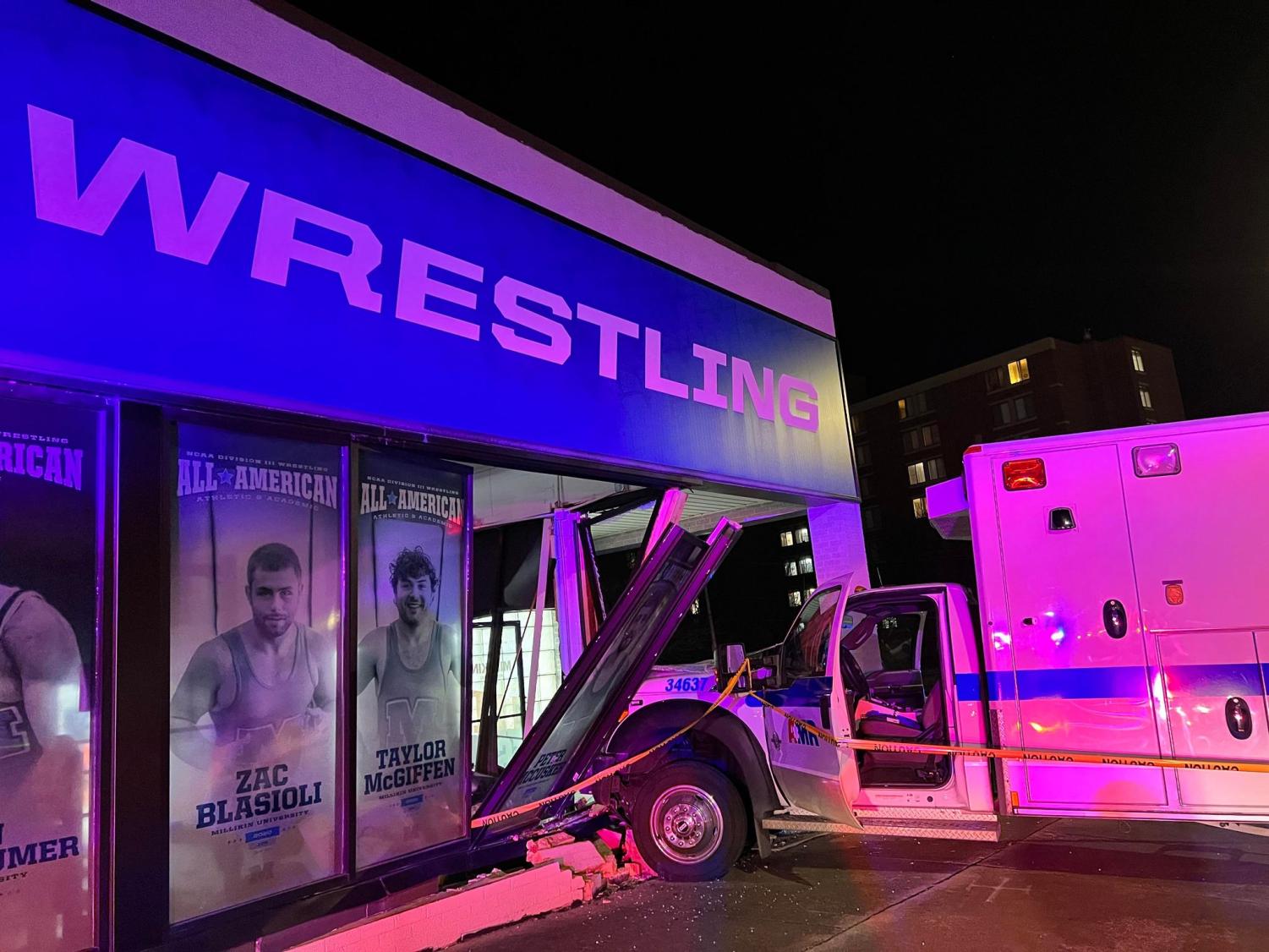 Ambulance Crashes into Millikin Wrestling Building