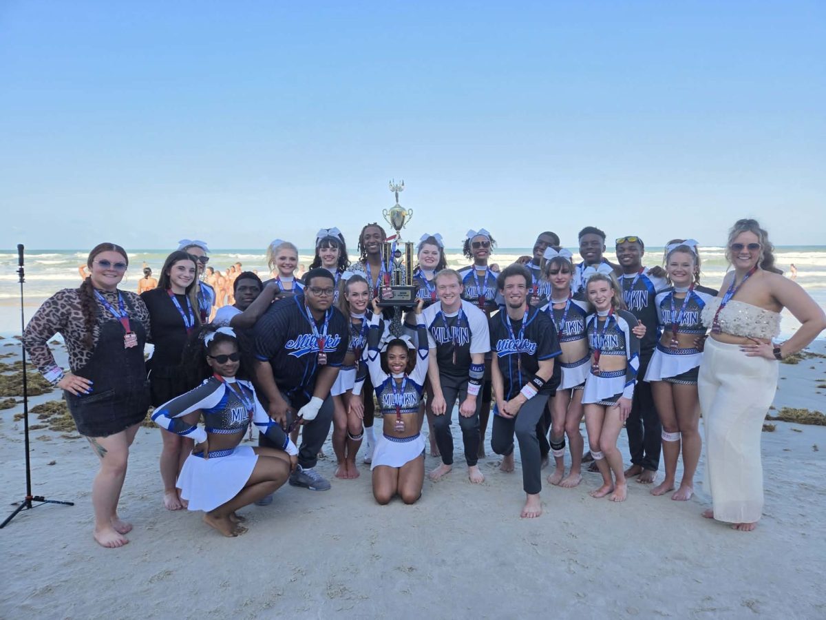 Millikin’s cheer team made history this year, winning its first-ever trophy at NCA Nationals.